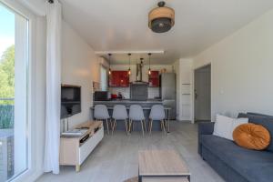 Kuchyň nebo kuchyňský kout v ubytování Appartement central 6 personnes à 10 minutes de Disneyland