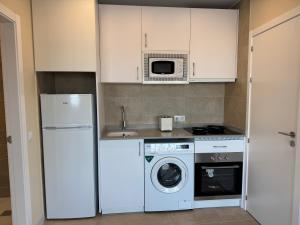 Kuchyň nebo kuchyňský kout v ubytování Besso Somhome