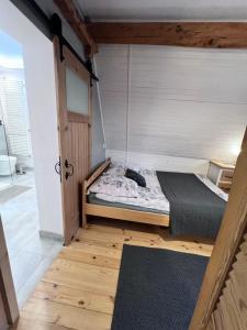 Łóżko lub łóżka w pokoju w obiekcie Villa Tatrydom
