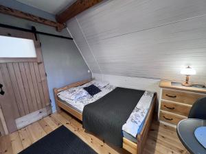 Łóżko lub łóżka w pokoju w obiekcie Villa Tatrydom