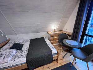 Łóżko lub łóżka w pokoju w obiekcie Villa Tatrydom