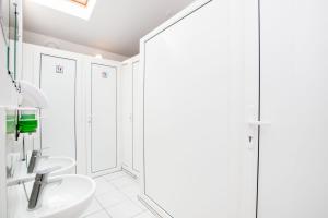 Koupelna v ubytování Gar'is Hostel Lviv