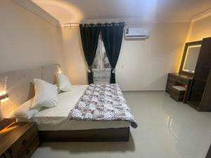 Katil atau katil-katil dalam bilik di شقة فندقية كود 18351للعائلات فقط
