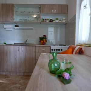 Kuchyň nebo kuchyňský kout v ubytování Apartments Cvitini Dvori Garjak
