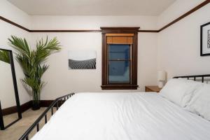 Ένα ή περισσότερα κρεβάτια σε δωμάτιο στο Stay Portland - Historic PDX Home - Sleeps 10, Perfect Location +18 φωτογραφίες