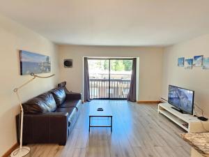 Televisyen dan/atau pusat hiburan di 1BDR Condo in the Heart of Olympic Valley! +15 gambar