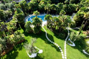 Vonkajšia záhrada v ubytovaní Parc Hotel Flora S