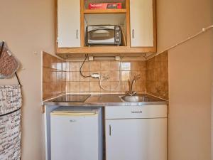 Kuchyň nebo kuchyňský kout v ubytování Studio confortable avec balcon pour 2 à Barbotan-les-Thermes, animaux admis, parking et wifi - FR-1-841-43 + 10 fotografií
