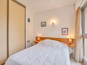 Postel nebo postele na pokoji v ubytování Appartement lumineux avec climatisation et animaux admis, Barbotan-les-Thermes - FR-1-841-6