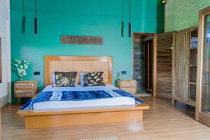 Postel nebo postele na pokoji v ubytování Mantra Yoga Homestay + 30 fotografií