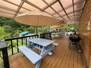 En balkon eller terrasse på Hongcheon The Pyeonhan Pension