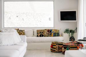 Fotografie z fotogalerie ubytování Exclusive Above Nammos Villa Villa Mystique Overlooking Famous Nammos Barrestaurant Infinity Pool Outdoor Bar And Bbq Mykonos v destinaci Psarou + 6 fotografií