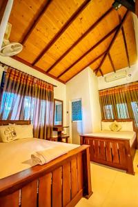 Postel nebo postele na pokoji v ubytování Harambathenna Resort Anuradhapura + 37 fotografií