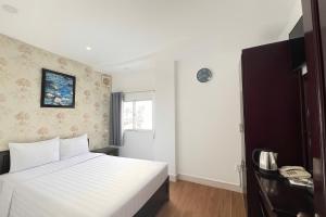 Ένα ή περισσότερα κρεβάτια σε δωμάτιο στο DDA Boutique hotel