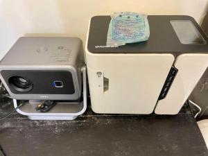 a computer printer sitting on top of a table at Shangri-La Mai Zhu Kung Gar Hotel in Shangri-La