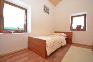 Postel nebo postele na pokoji v ubytování Holiday Home Paklenica