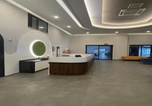 a lobby with a reception desk in a building at Luxury Seaview Villa with 9000 m2 SPA Access in Alanya +71 photos