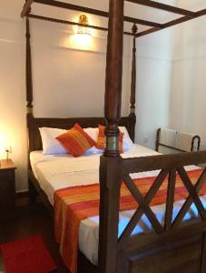 Postel nebo postele na pokoji v ubytování Galle Breeze Inn - Gaalu Sulang by CM Holiday