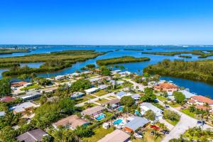 an aerial view of a village on the river at 721 Java Rd in Cocoa Beach