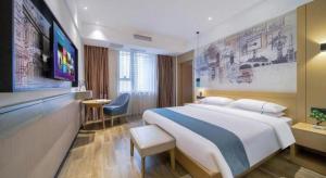 TV a/nebo společenská místnost v ubytování City Comfort Inn Chongqing Jiangbei International Airport