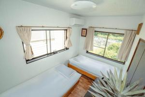 Postel nebo postele na pokoji v ubytování 山崎公園-箱根湯本駅-最大8名