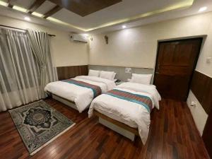 Letto o letti in una camera di President Hotel Airport