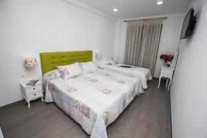 Posteľ alebo postele v izbe v ubytovaní Hostal Boutique Bajamar
