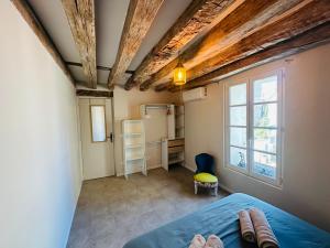 Postel nebo postele na pokoji v ubytování Maison 3 chambres 8 pers proche Zoo de Beauval