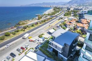 an aerial view of a city and the ocean at Luxury Seaview Villa with 9000 m2 SPA Access in Alanya
