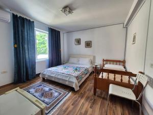 Ένα ή περισσότερα κρεβάτια σε δωμάτιο στο Casa Ana
