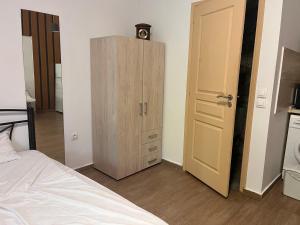 Postel nebo postele na pokoji v ubytování WOOD STUDIO