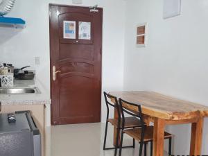 Kuchyň nebo kuchyňský kout v ubytování V- Studio Unit