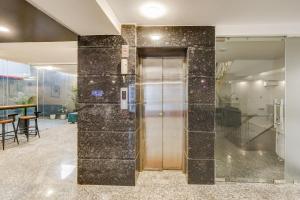 Fotografie z fotogalerie ubytování Super Townhouse Oak Udyog Vihar v destinaci Gurgáon