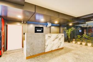 Fotografie z fotogalerie ubytování Super Townhouse Oak Udyog Vihar v destinaci Gurgáon