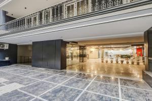Fotografie z fotogalerie ubytování Super Townhouse Oak Udyog Vihar v destinaci Gurgáon