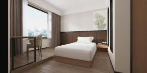 Postel nebo postele na pokoji v ubytování GreenTree Inn Puyang Pushang Huanghe Road + 37 fotografií
