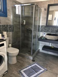 A bathroom at Iliovasilema VILLAGE