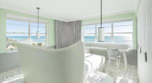 a white room with a table and a dining room at COMO Metropolitan Miami Beach in Miami Beach