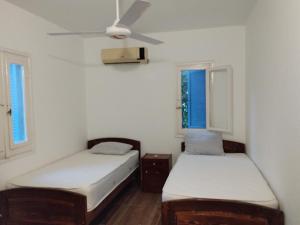 A bed or beds in a room at Diplo 1- k 45 challet with private garden