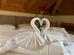 Postel nebo postele na pokoji v ubytování Hotel Savoia