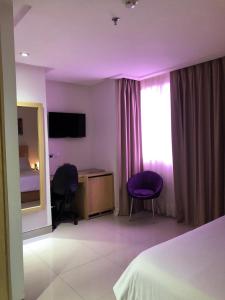 Postel nebo postele na pokoji v ubytování Radisson Diamond Barranquilla