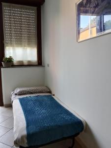 Кровать или кровати в номере Casa loto +9 фотографий