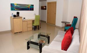 TV a/nebo společenská místnost v ubytování Radisson Diamond Barranquilla