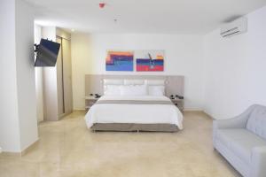 Postel nebo postele na pokoji v ubytování Radisson Diamond Barranquilla