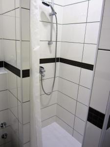 Koupelna v ubytování Aurelia Rooms + 37 fotografií