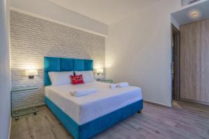 Posteľ alebo postele v izbe v ubytovaní Plakias Seaside Residences