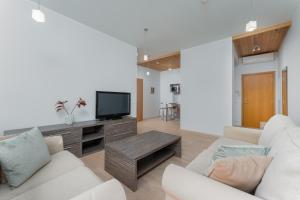 TV a/nebo společenská místnost v ubytování Sadama 4 holiday apartment
