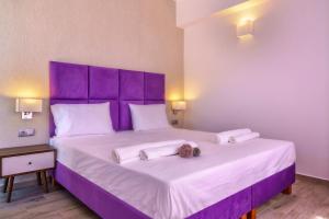 Posteľ alebo postele v izbe v ubytovaní Plakias Seaside Residences + 20 fotografií