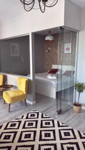Postel nebo postele na pokoji v ubytování Apartament Avram Iancu Florești