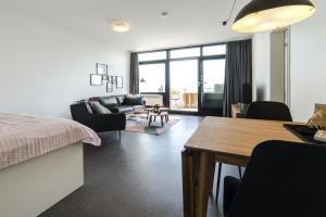 Posezení v ubytování Meerblick pur – Wohnung Strandhafer am Südstrand